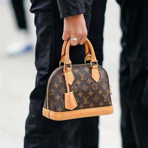 louis vuitton gold alma bag|Louis Vuitton Alma bag sizes.